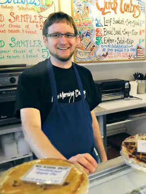 Tristan James behind the counter at New Morning Bakery